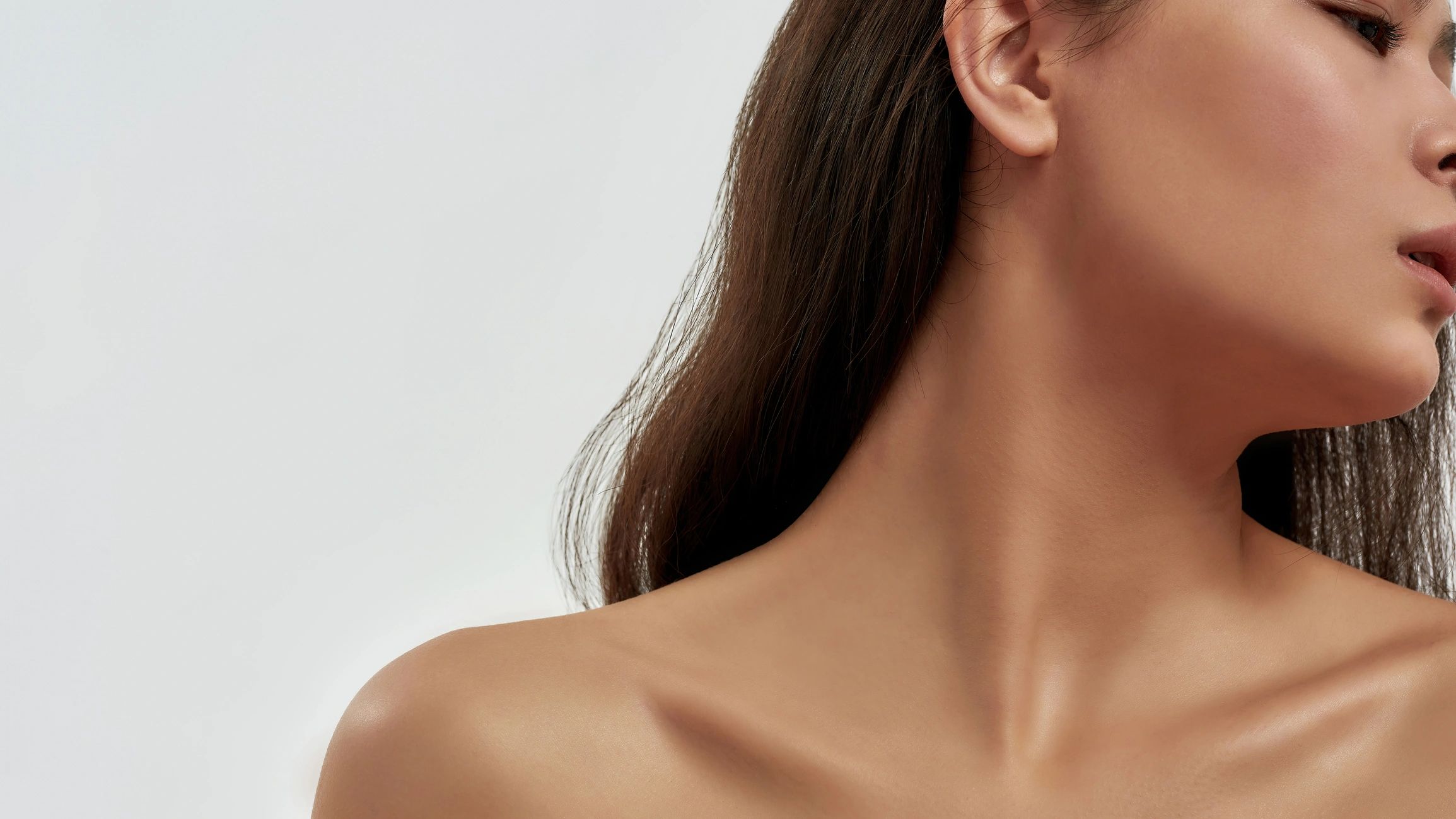Woman with flawless skin promoting beauty services