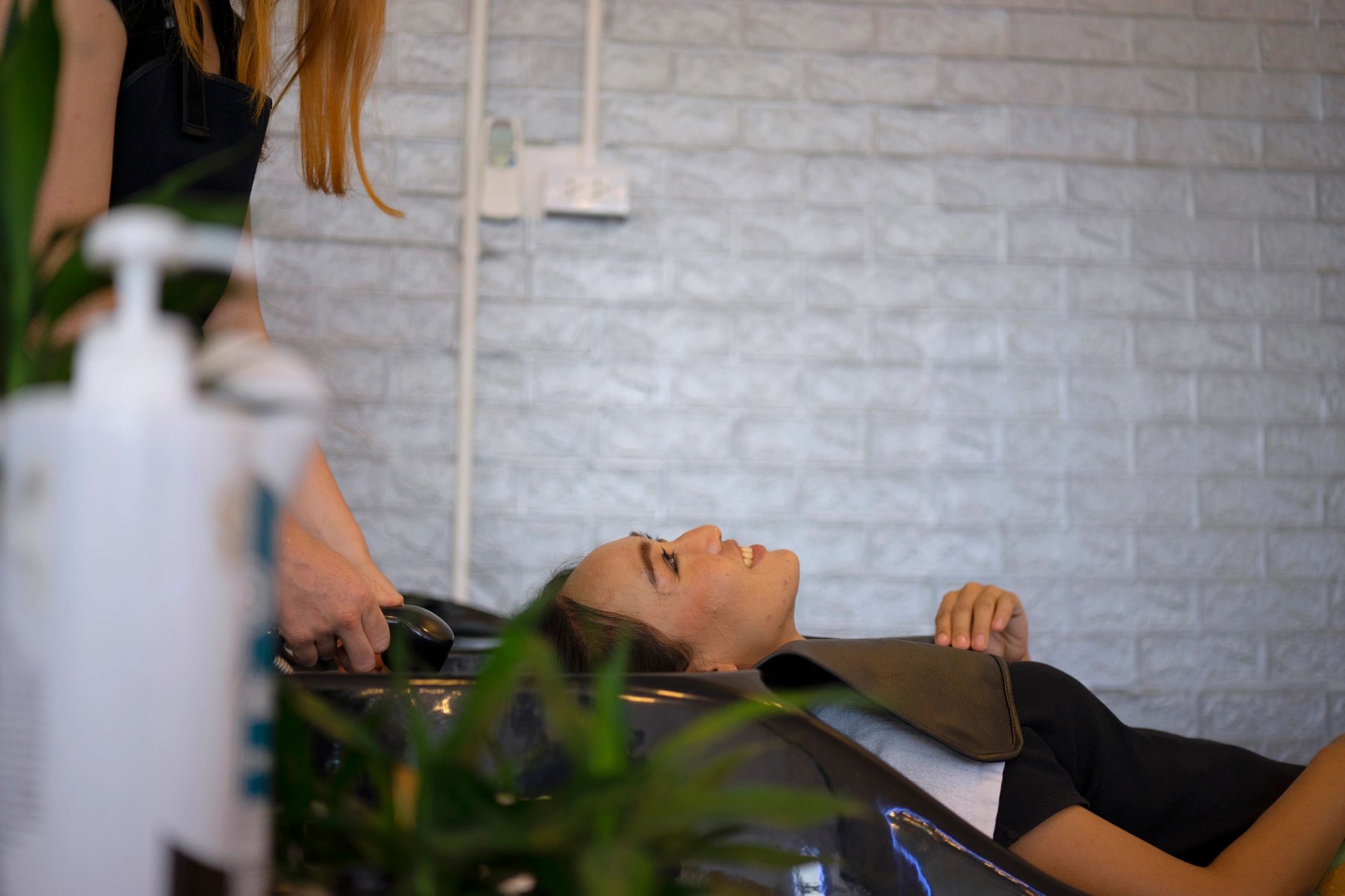 Makeup artist working with a client