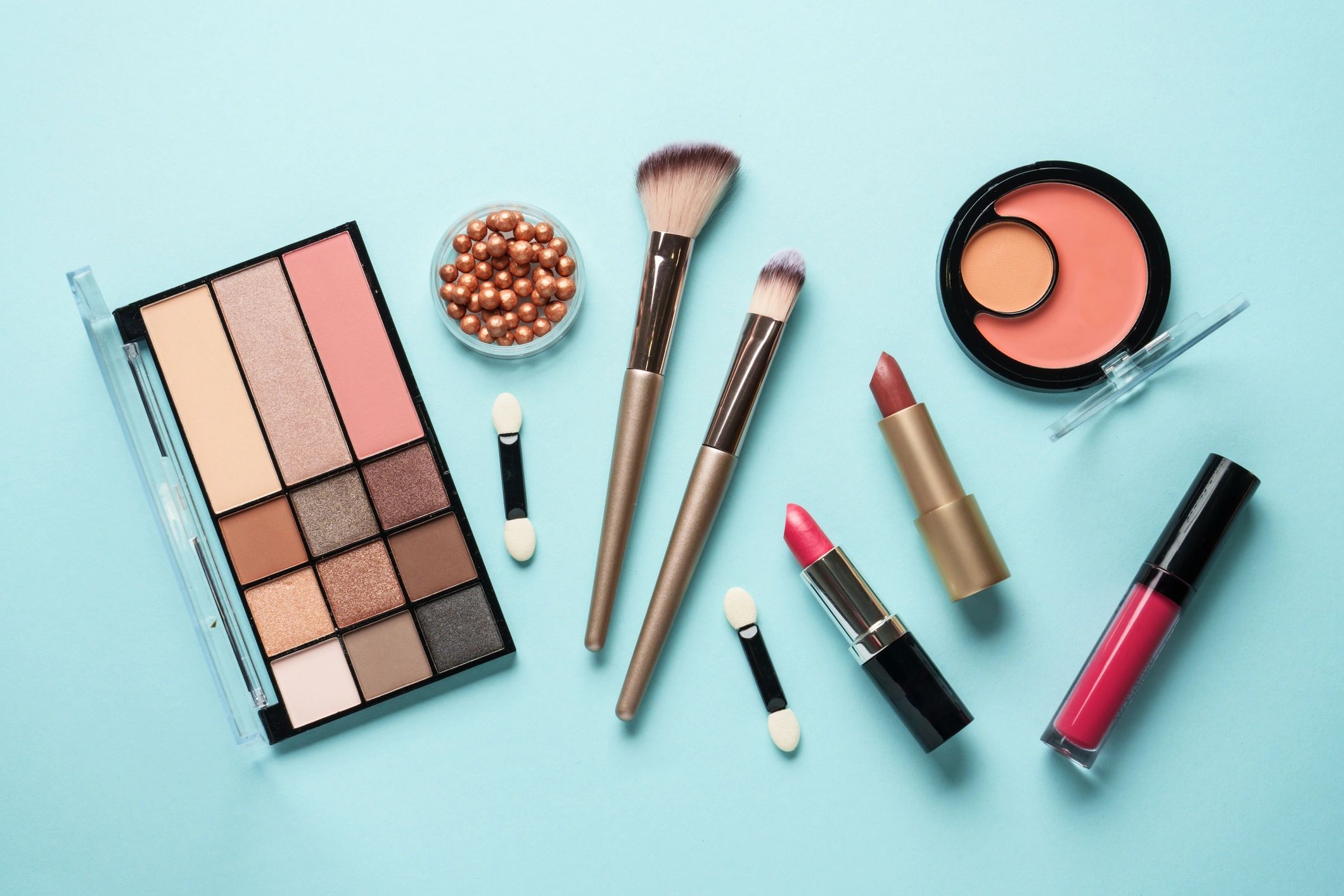 Beauty products arranged in a flat lay